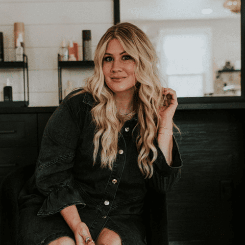 Portrait of Kellie, a professional stylist at Haven Salon Pittsburgh, showcasing their expertise and style.
